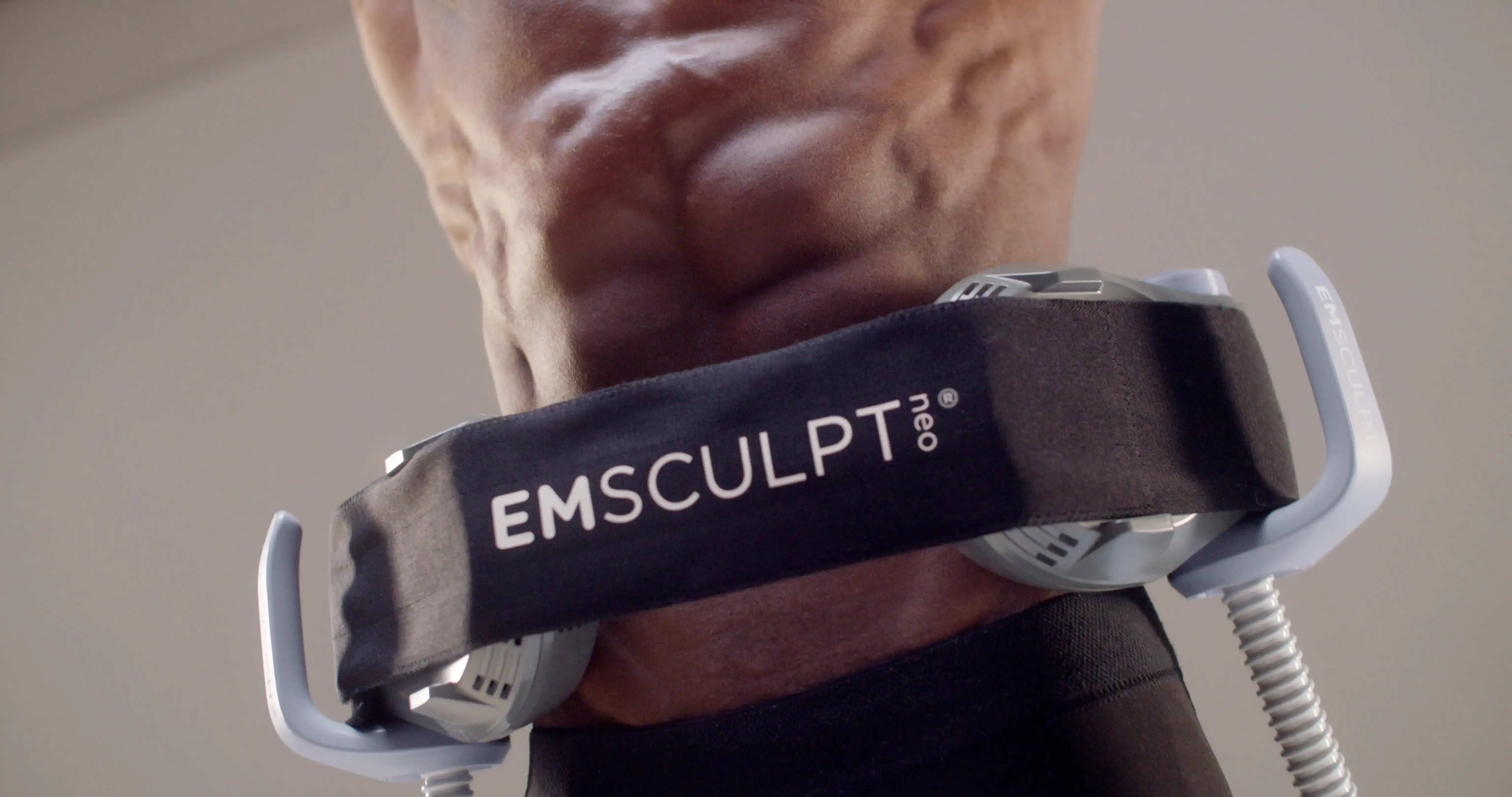 Adult patient discussing Emsculpt Neo body contouring candidacy in Reisterstown