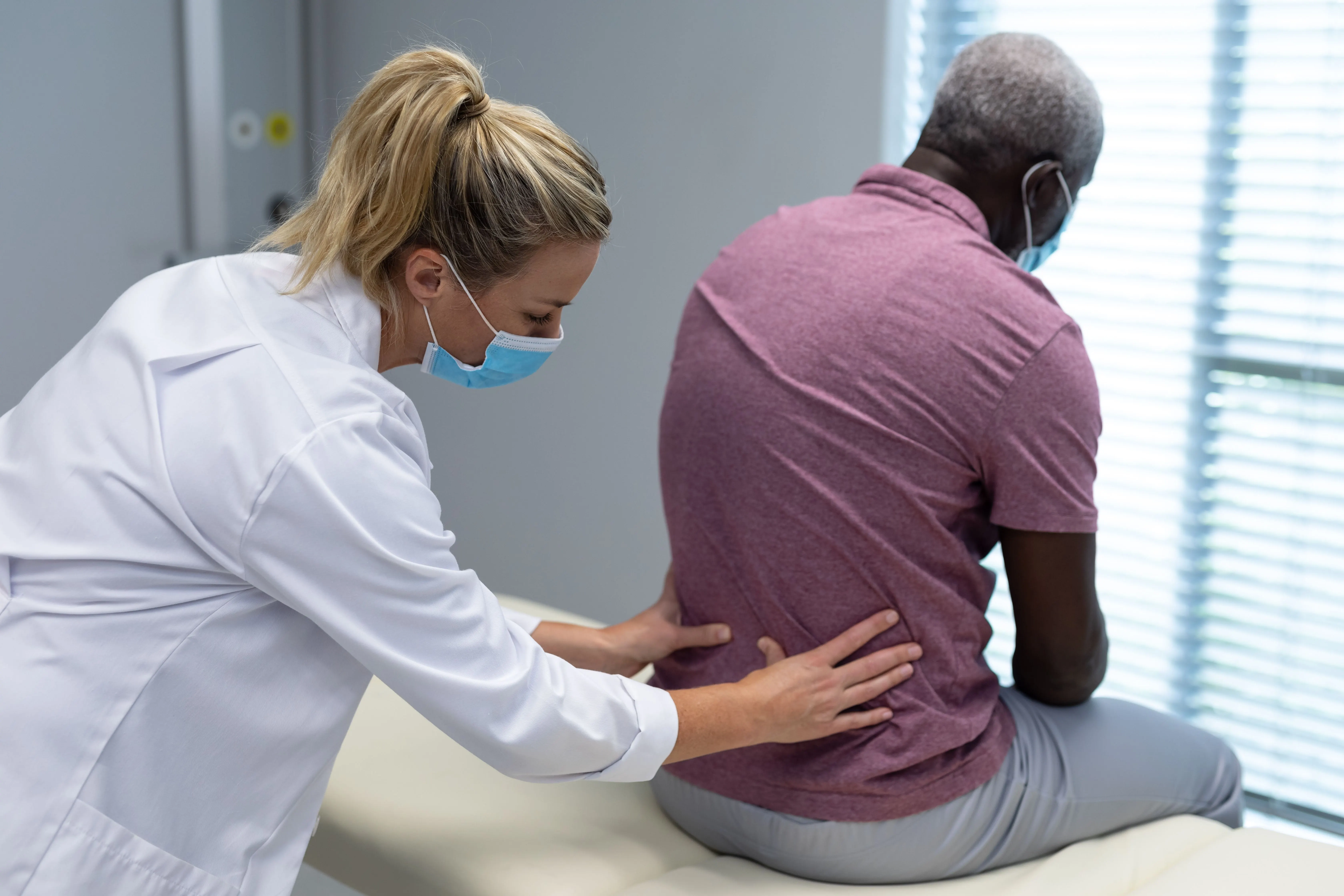 Diagram showing spinal disc degeneration process at Pain Treatment Center of Maryland Reisterstown