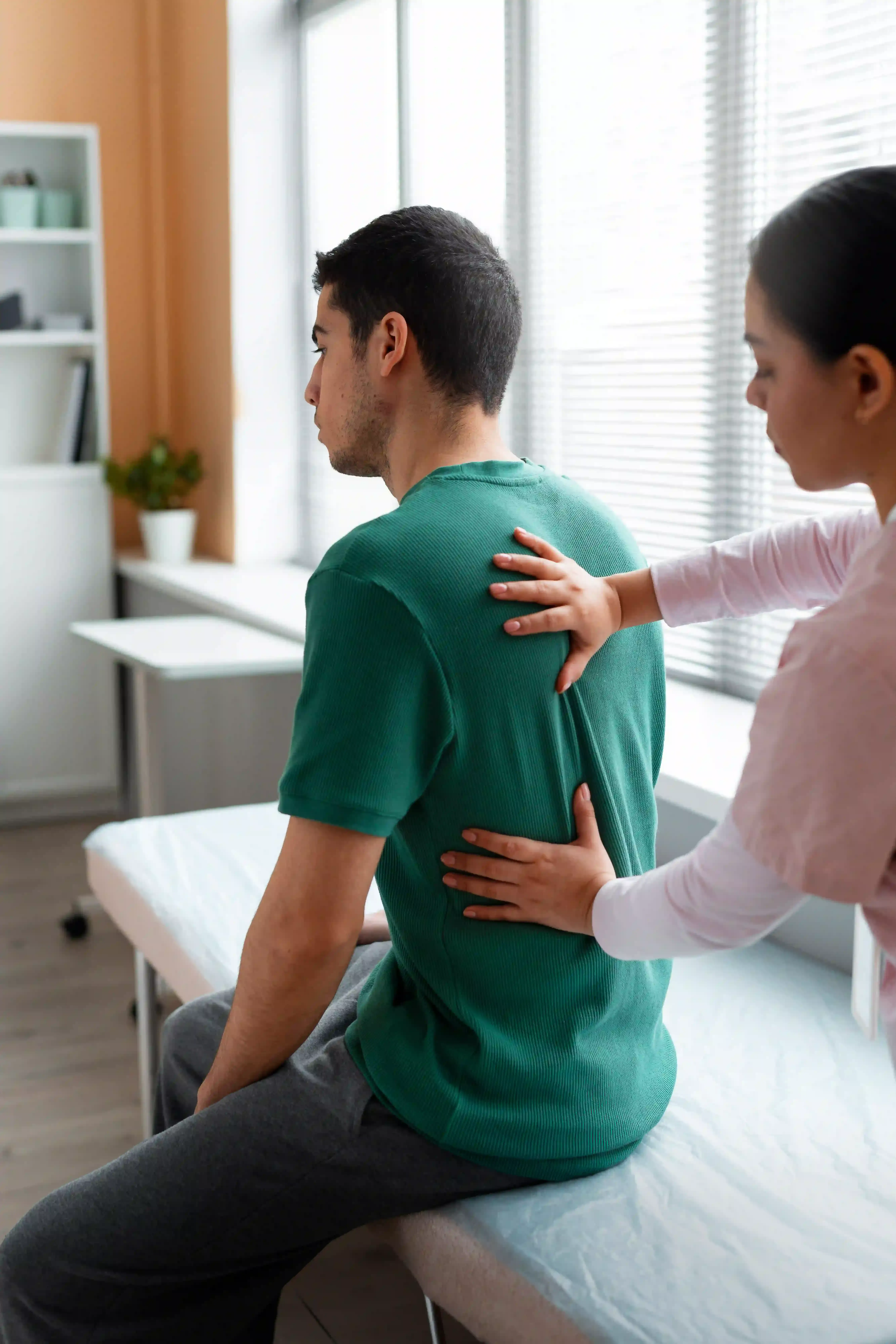 Patient being evaluated for radiofrequency ablation candidacy at Pain Treatment Center of Maryland