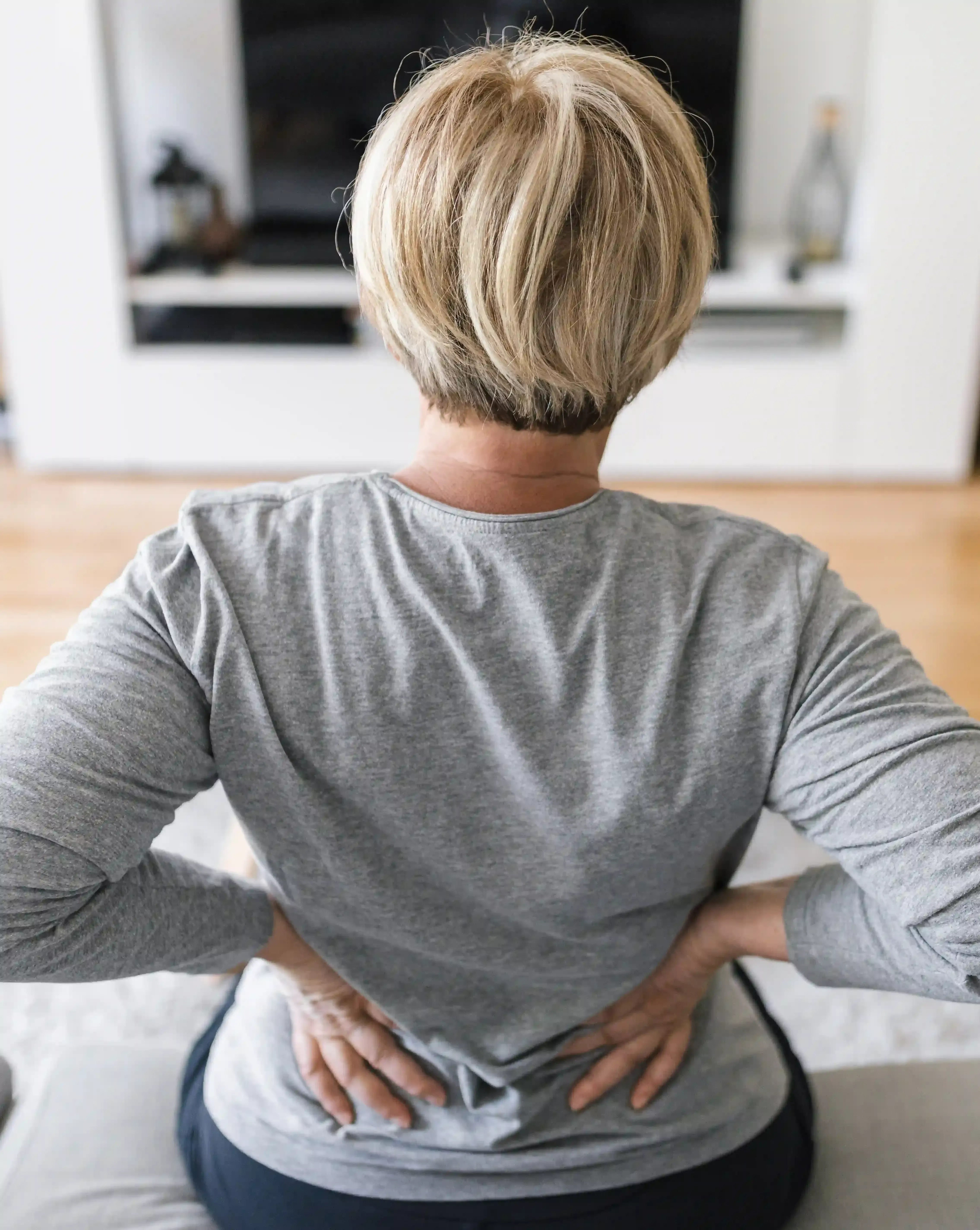 Patient describing back pain symptoms to Dr. Reznikov at Pain Treatment Center of Maryland Reisterstown