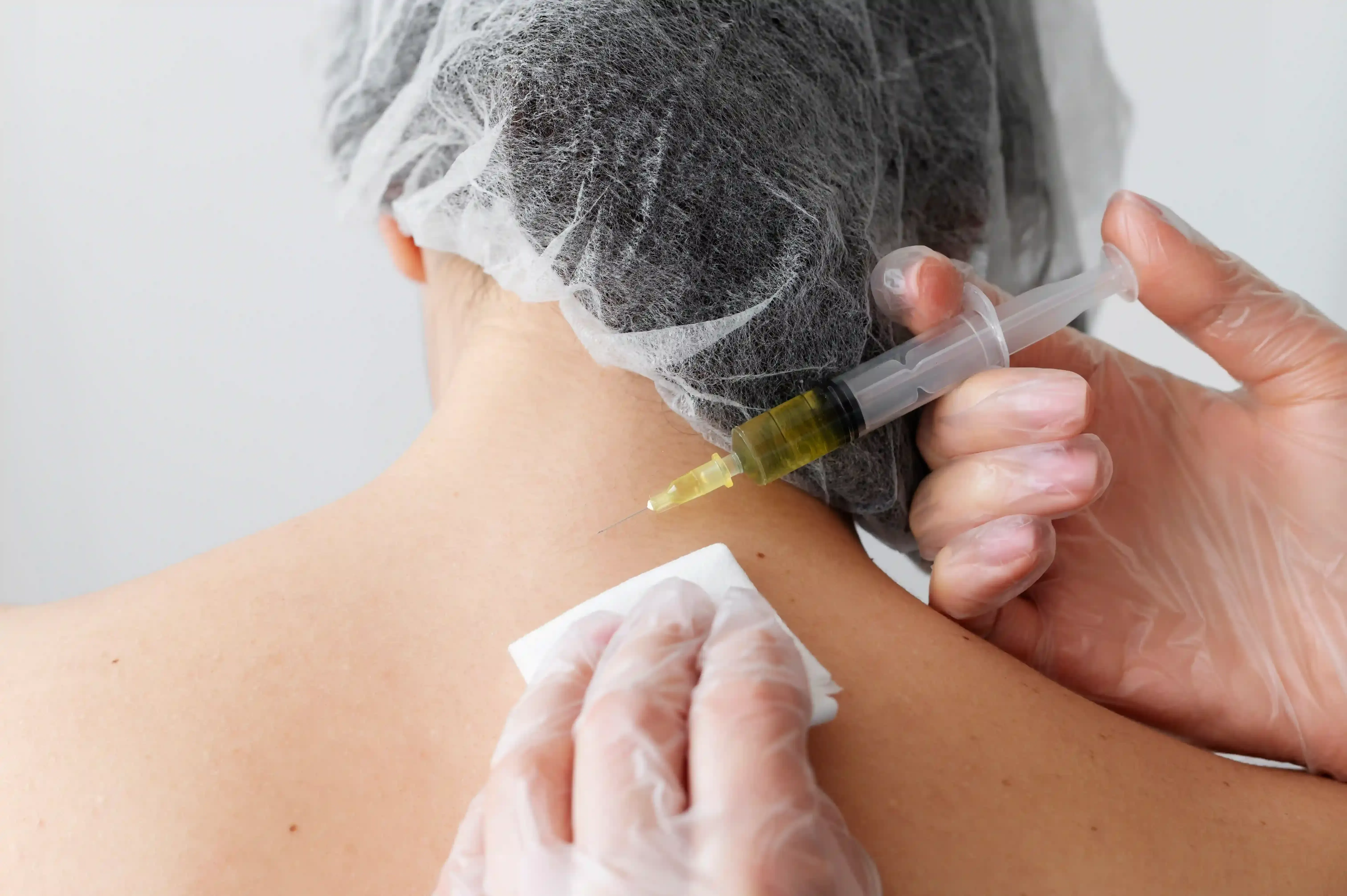 Patient consulting with Dr. Reznikov about epidural steroid injection benefits