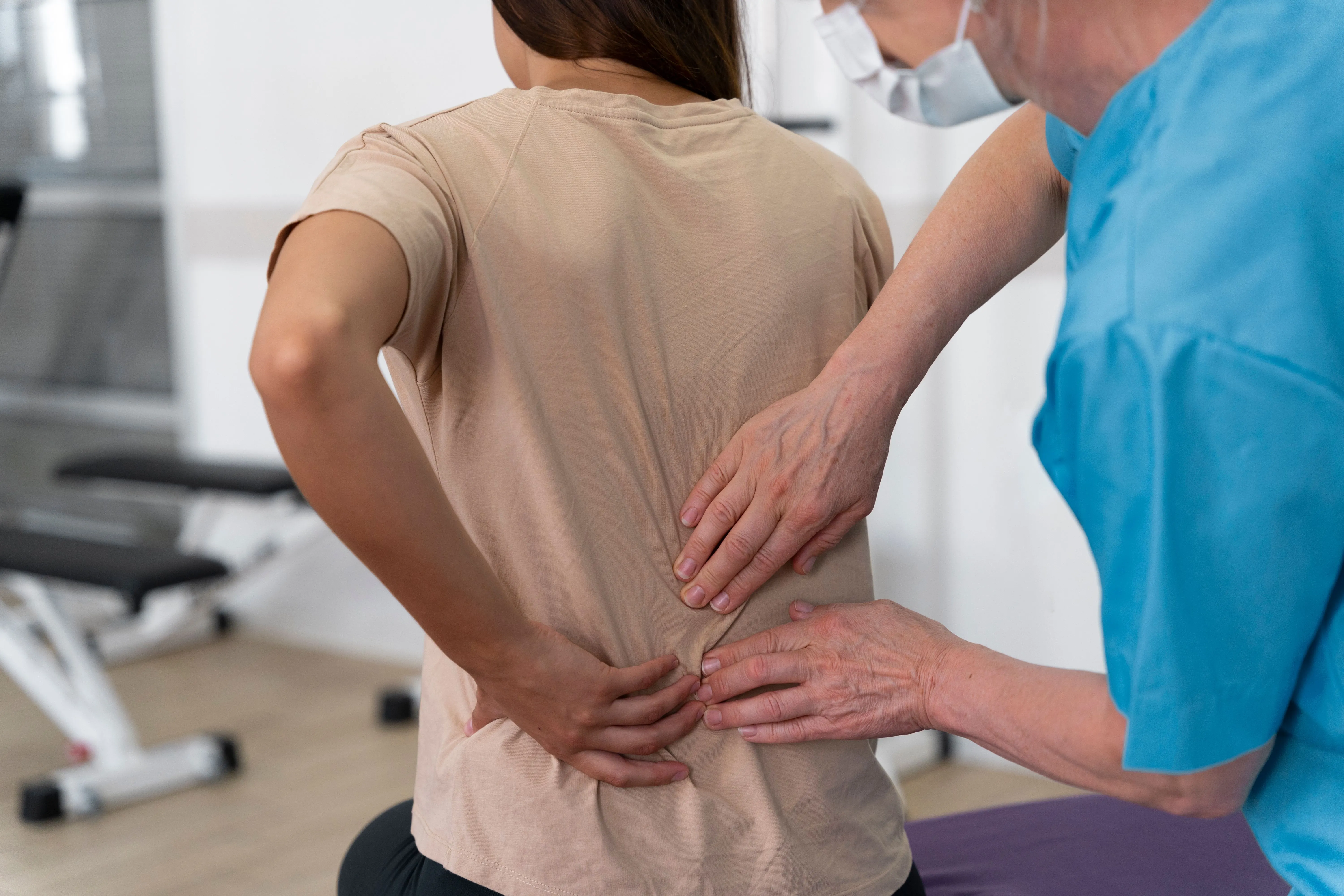 Diagram showing nerve compression from herniated disc at Pain Treatment Center of Maryland