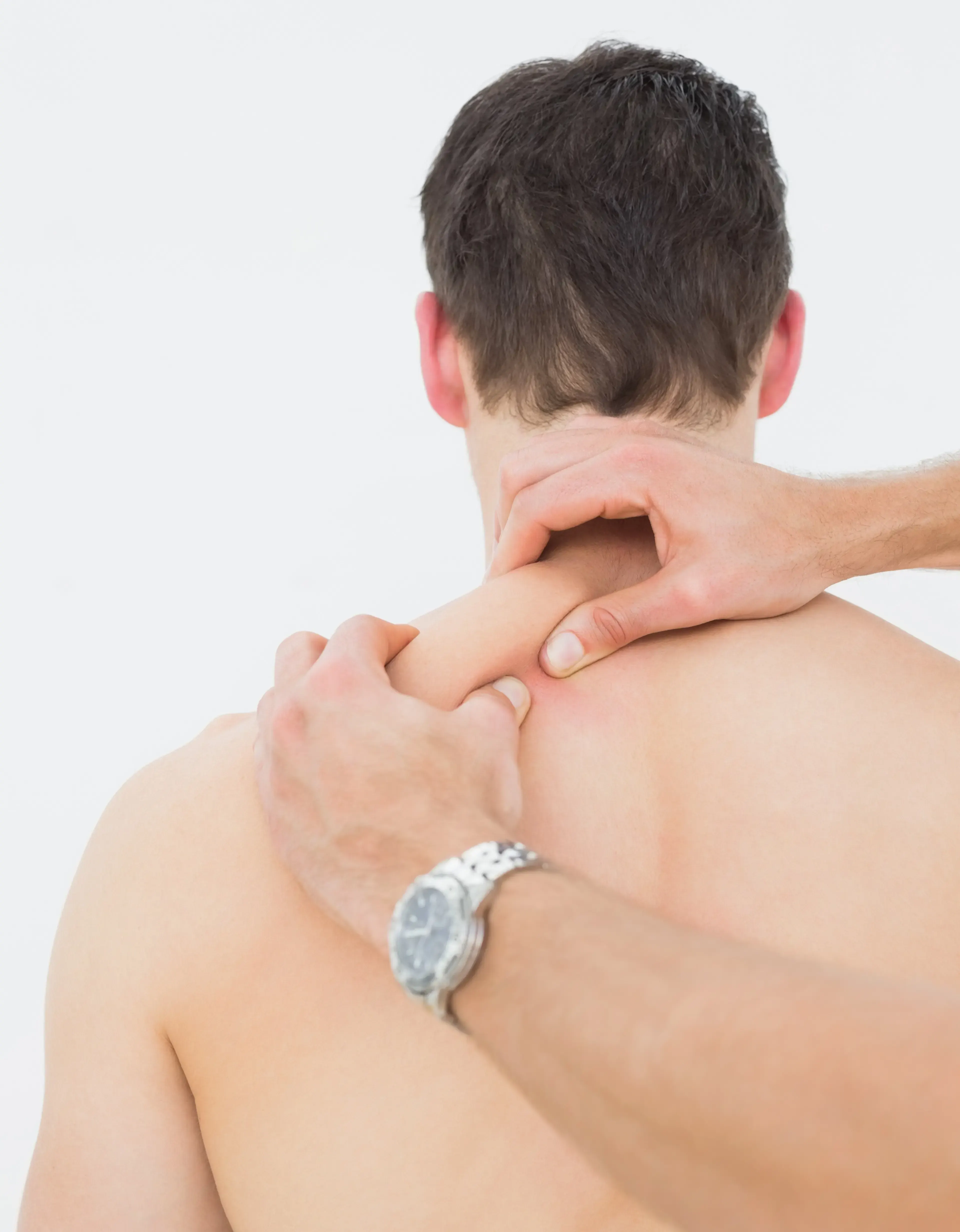 Patient being evaluated for trigger point injection candidacy at PTCOFMD