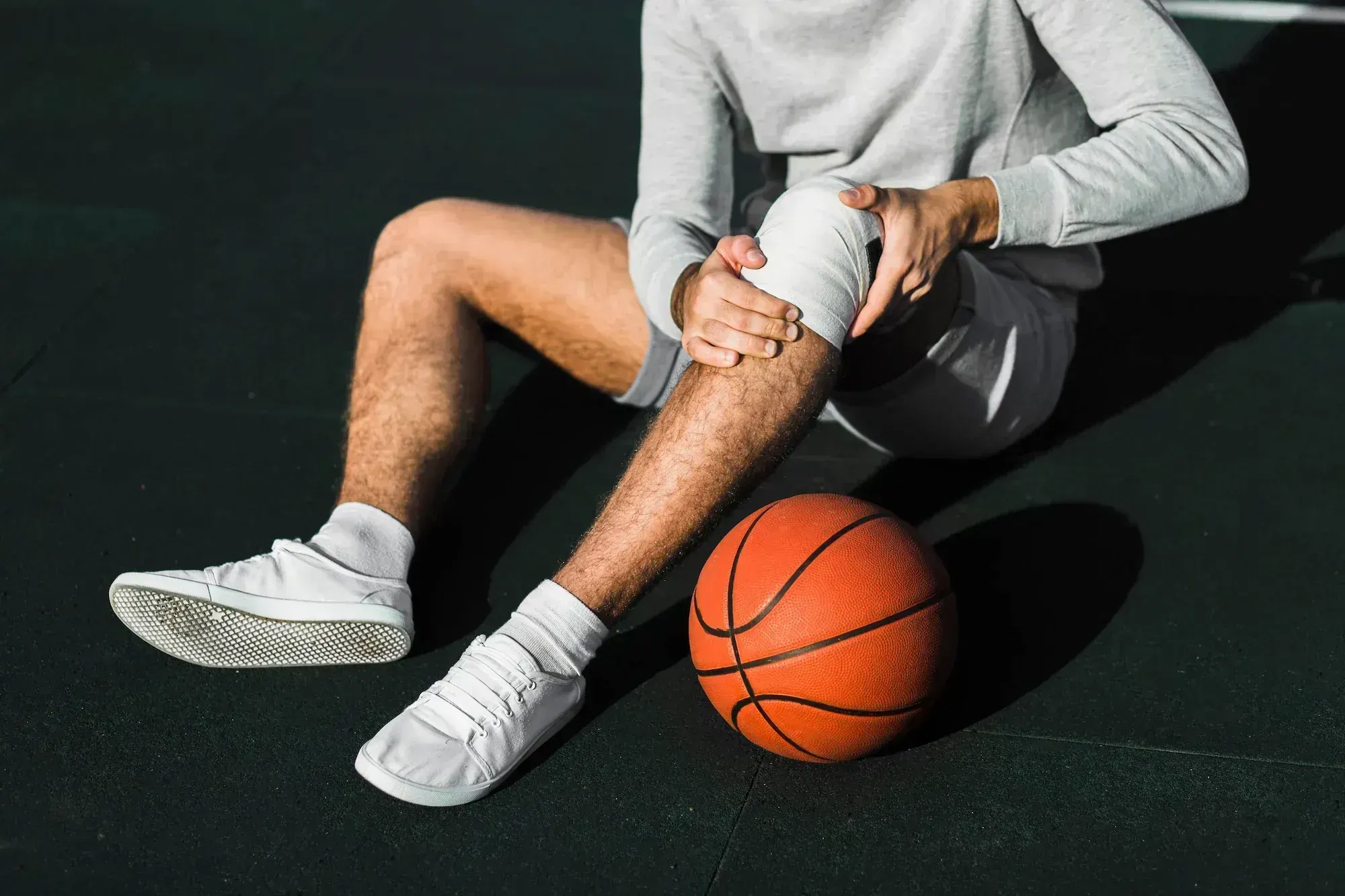 Background visual of common sports injury areas at Pain Treatment Center of Maryland